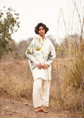 A Model Wearing White Cotton Mul Pahadi Shirt,curated by Only Ethikal